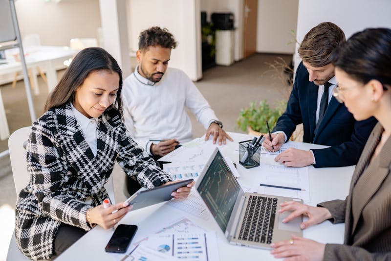 Business team reviewing financial reports